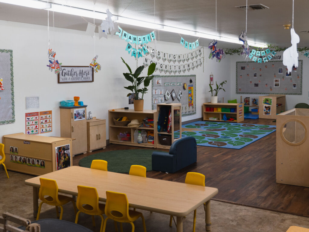 early preschool circle-time and soft-play area with pillows and toys